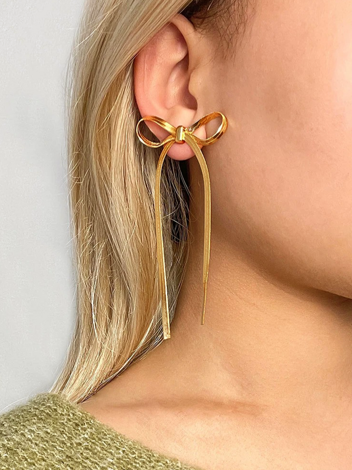 Cathy | Dames Lange Snake Chain Strik Oorbellen Goud voor Vrouwen