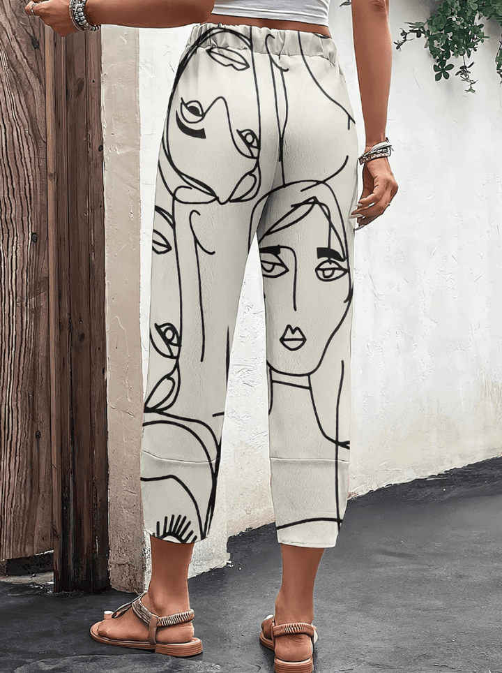 Lisa | Elegante Losse Dames Broek met unieke Faceprint | Comfortabel & Trendy - Sorata