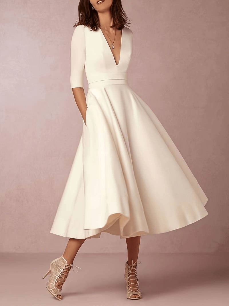 Nina | Retro Swingjurk | Witte Dames Jurk Met Diepe V - Hals - Sorata